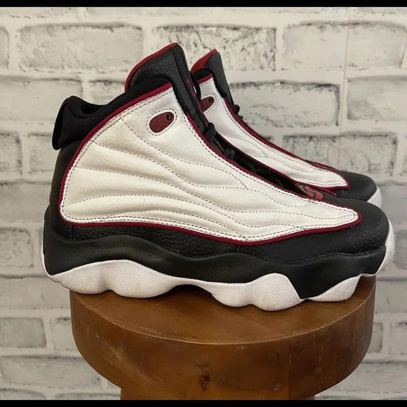 jordan pro strong black varsity red